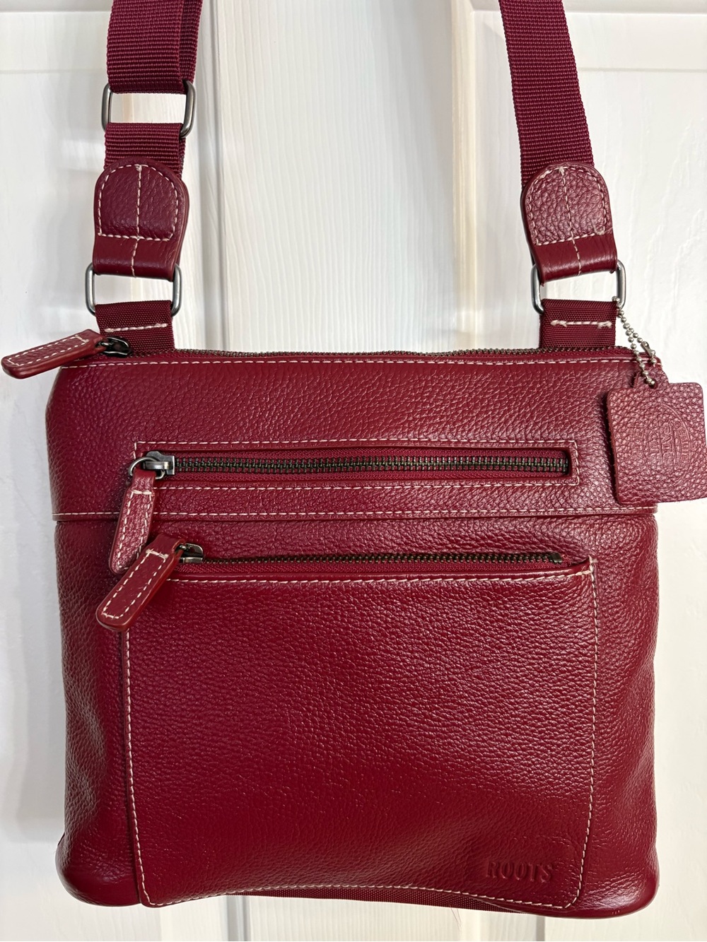 Roots Deep Red Pebble Leather Crossbody Bag